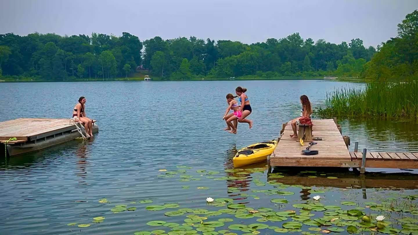 Kids jumping off dock