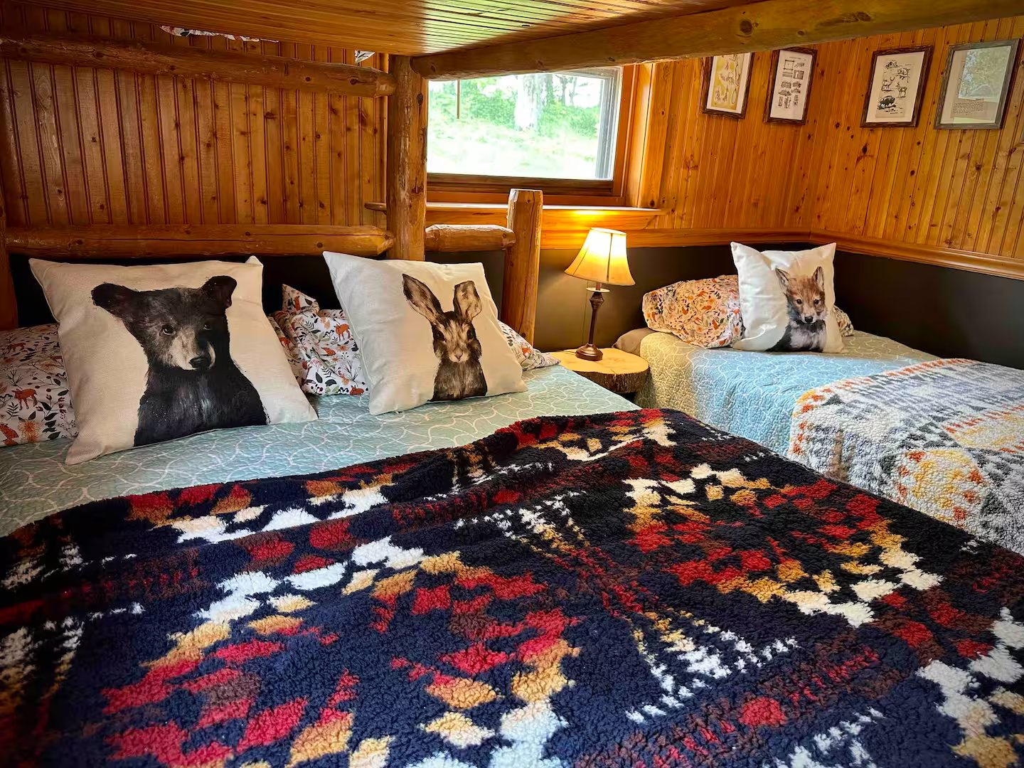 Animal pillows on log beds